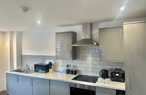 Yeadon Apartment | Two Bedroom Flat by Brookland Stays Serviced Accommodation Short Lets Leeds with Free WiFi