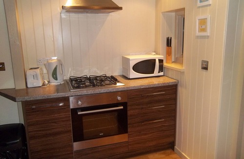 Fowey Apartment | Two Bedroom Loft Apartment Overlooking St Fimbarrus Church & Its Grounds