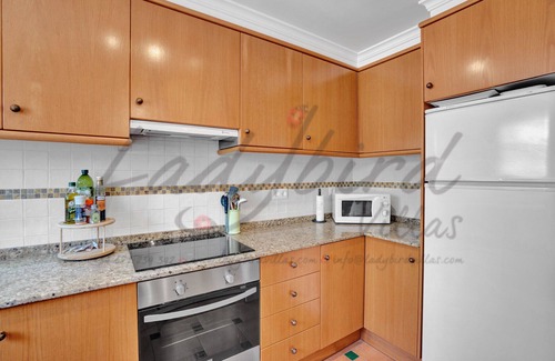 Denia Ski Chalet | Two bedroom terrace house with stunning communal pool and gardens