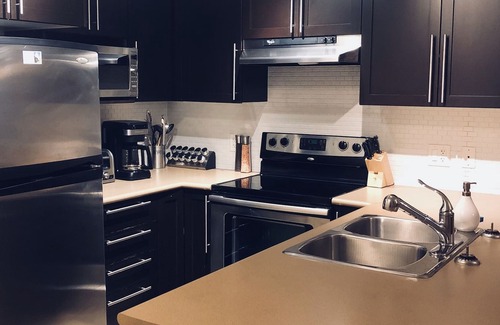 Kelowna Central Business District Condo | Two bedroom two bath downtown condo just steps from the pool and hot tubs