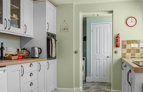 Keswick Cottage | Two Chimneys is an attractive and traditional Lakeland terraced cottage, with Wi-Fi, garden and priv