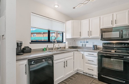 Pagosa Springs Condo | Two-Level Condo w/Mountain View, Wood Stove, WiFi, Laundry & Central Location