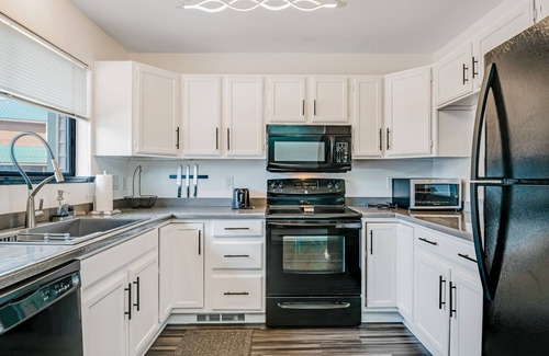Pagosa Springs Condo | Two-Level Condo w/Mountain View, Wood Stove, WiFi, Laundry & Central Location