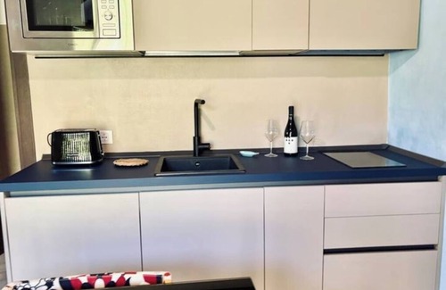 Modica Apartment | two-room apartment with small beam (37 sqm)