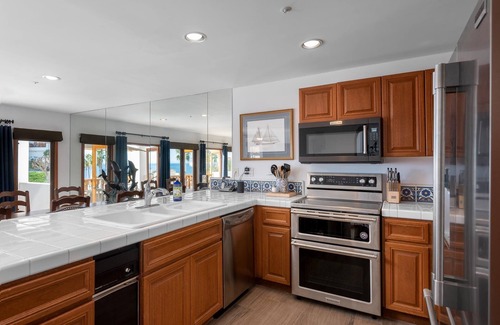 Avalon Condo | Two story 3B|3B villa with ocean views & golf cart