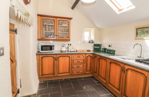 Holyhead Cottage | TY FFERM BODLASAN, family friendly, with open fire in Llanfachraeth