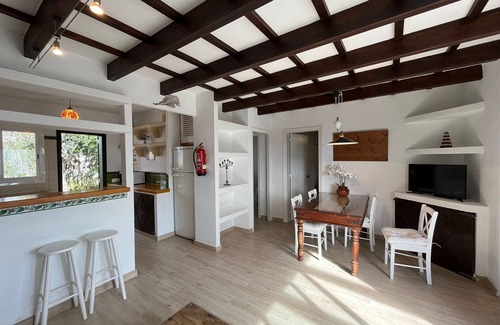 Cala Blanca Ski Chalet | Typical Menorcan house steps from the beach. Pool, garden, barbecue and fireplace