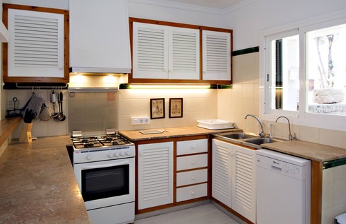 Cala Blanca Ski Chalet | Typical Menorcan house steps from the beach. Pool, garden, barbecue and fireplace