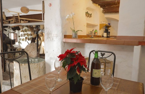 Competa House | Unique stay in a restored olive mill museum.
