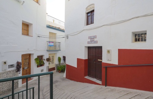Competa House | Unique stay in a restored olive mill museum.
