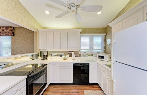 Whitney Beach Condo | Unit #313 Sand Cay Beach Resort Pool and Garden
