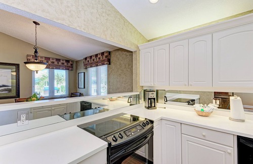 Whitney Beach Condo | Unit #313 Sand Cay Beach Resort Pool and Garden