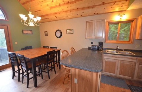 Suttons Bay House | "Up north" waterfront lodge on West Bay. Spacious deck with gas grill.