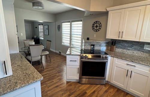 Milwaukee House | Updated 2BR, 2.5BA. Hot tub, fenced in yard, modern updates.