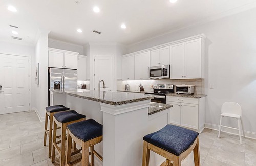 American Beach House | Updated Townhome near the Ocean w/Private Patio, Shared Pool, Central A/C