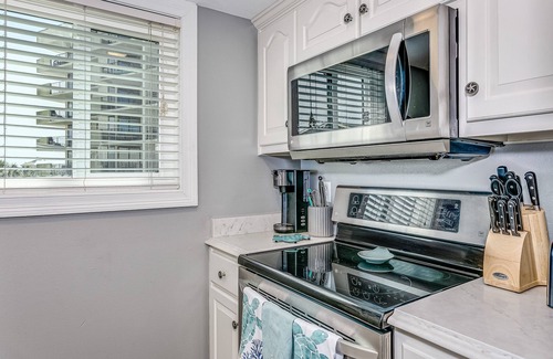 Pensacola Beach House | Updated waterfront condo. Short walk to the Beach! Family friendly
