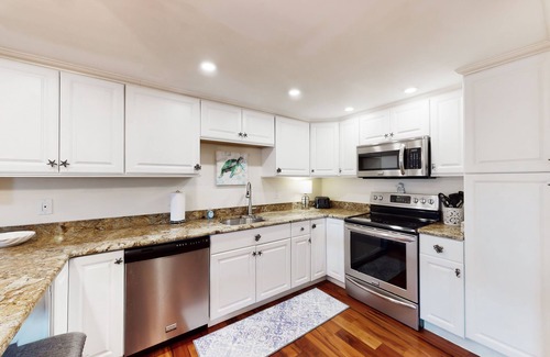 Ocean City Condo | Updated waterfront condo with washer/dryer, central AC, & seasonal pool
