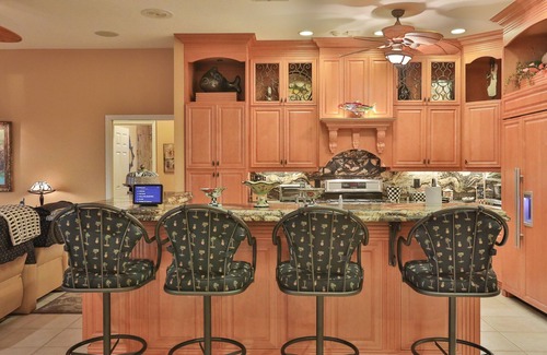 Naples House | Upscale waterfront home with private dock, saltwater pool, lanai, grill, & W/D