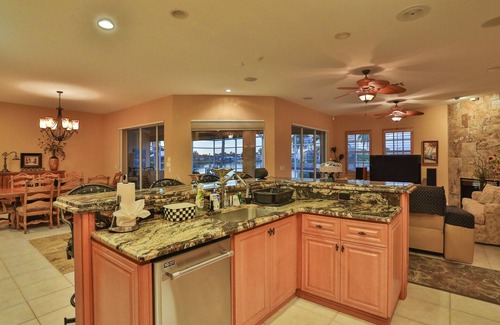 Naples House | Upscale waterfront home with private dock, saltwater pool, lanai, grill, & W/D