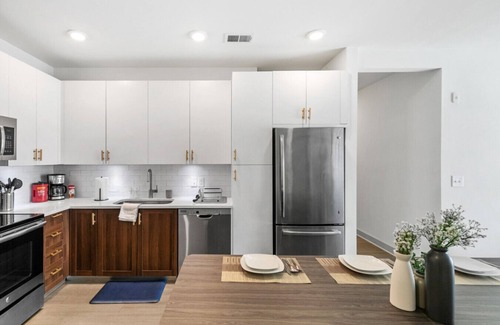 Forest Park Apartment | Urban Elegance: 3BR Condo Experience