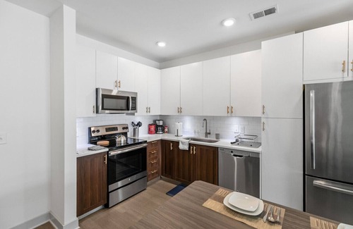 Forest Park Apartment | Urban Elegance: 3BR Condo Experience