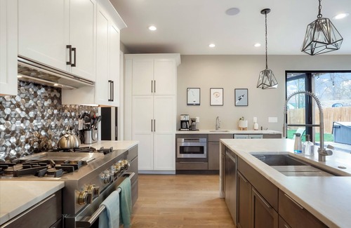 Sunnyside House | Urban Perfection! Modern Home, 2 Primary BRs, hot tub, boccee, game room, patio.