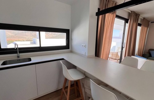 San Jose Ski Chalet | Urbanization with swimming pool and gym. BBQ and private solarium. Panoramic views.