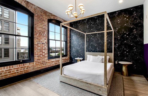 Central Business District Hotel | Sextant The Brandywine Rooftop Pool 5 min drive to Bourbon St 4 Bed 4 Bath