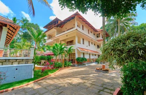 Sulthan Bathery Resort | Ushasree Wayanad Pool Resort by VOYE HOMES