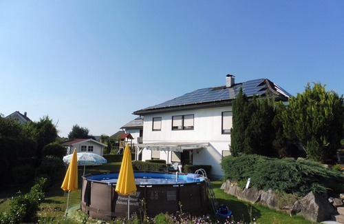 Bisingen Apartment | Vacation apartment 'Gästehaus Zollerblick' with a view of Hohenzollern Castle and shared pool