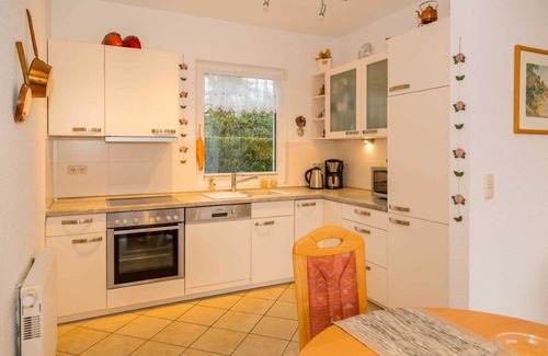 Trassenheide Apartment | Vacation home Alexander, incl. WLAN, 2 terraces & barbecue - semi-detached house