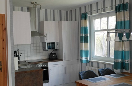 Karlshagen Apartment | Vacation home Sellin, child-friendly, barbecue, terrace, WLAN - Holiday home