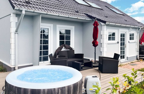 Luetow House | Vacation homes island Usedom house Jojo 7 -view of the Achterwasser- sauna, whirlpool