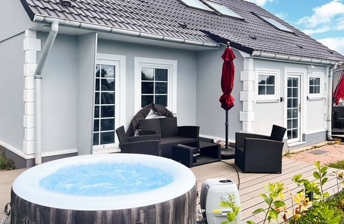 Luetow House | Vacation homes island Usedom house Diego 9 -view of the Achterwasser- sauna whirlpool
