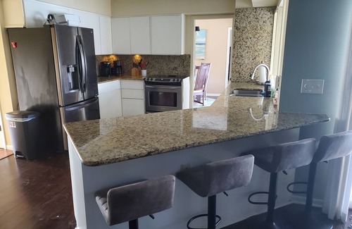 Venice House | Venice 3 Bedroom Waterfront Home with Pooled Lanai for short term rental