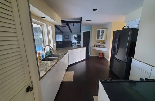Venice House | Venice 3 Bedroom Waterfront Home with Pooled Lanai for short term rental