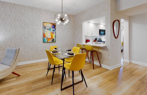 Palm Springs Apartment | Vibrant dog-friendly condo with hot tub, tennis court, pool, W/D, grill & patio