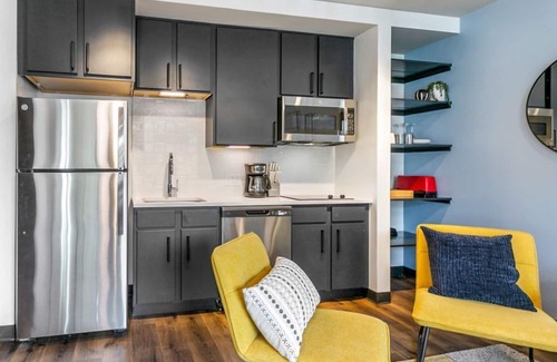 Central Business District Hotel | Vibrant NOLA 2BR Respite Condo with 2 Balconies