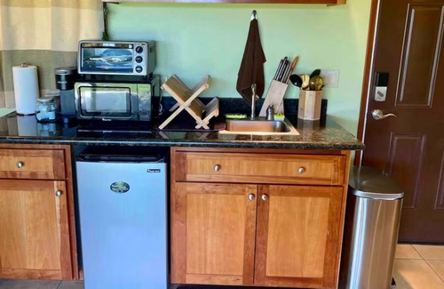Pu'uanahulu Apartment | View of Mauna Kea in Gated Community across from Golf Course