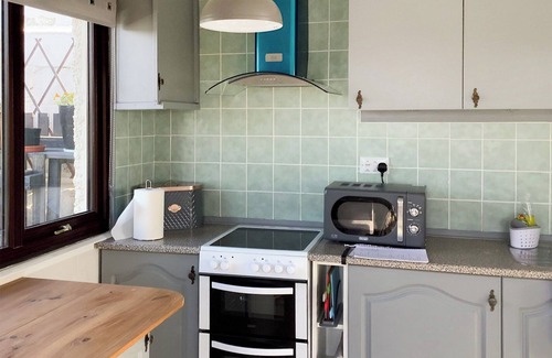 Anderby Creek Cottage | Views inland across the fields and only 100 yards to the unspoilt sandy beach at Anderby Creek.