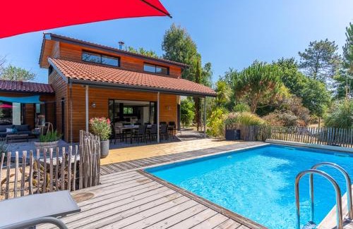 Biscarrosse Villa | Villa familiale 10 pers. à Biscarrosse avec piscine chauffée, près du lac et des pistes cyclables - FR-1-319-488
