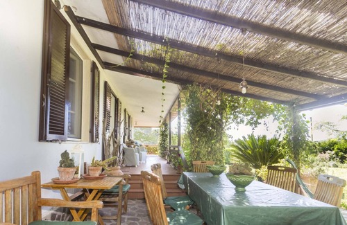 Porto Azzurro Villa | Villa Monserrato with garden and sea view
