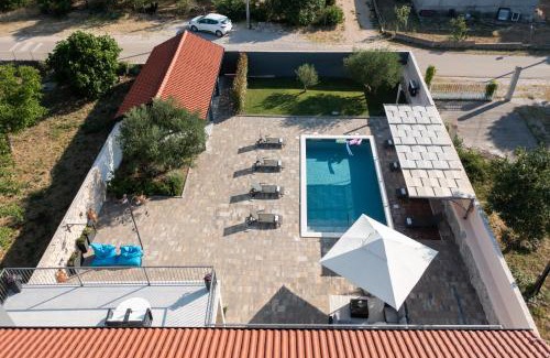 Benkovac Villa | Villa Pietra- Modern rustic poolside oasis