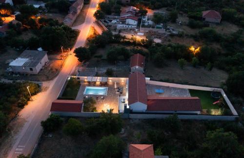 Benkovac Villa | Villa Pietra- Modern rustic poolside oasis