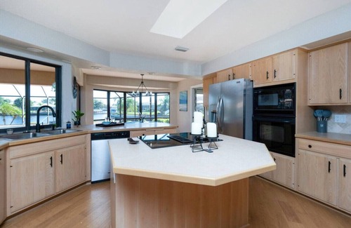 Punta Gorda Apartment | Villa Tropical | Waterfront Luxury in Punta Gorda Heated Pool Spa Dock