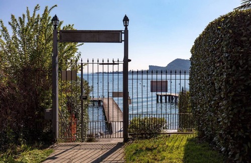 Villaggio Sanghen Apartment | Villaggio Heliopolis Cottage 84 with terrace 2 minutes from the lake