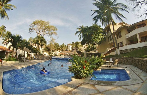 Peninsulas de Santiago Condo | Villas del Palmar - Condo 704