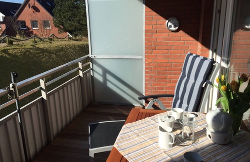 Wittduen Apartment | Vis-à-vis the Wadden Sea, spacious, comfortable 1-room apartment, large balcony. south-facing balcony, WLAN