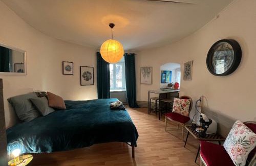 Porrentruy Apartment | Vivez un conte de fée dans la pièce ronde d'une tour médiévale