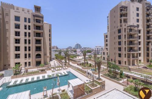 Umm Suqeim 3 Apartment | Vogue Madinat Jumeirah Living with Pool View and Balcony - brand new